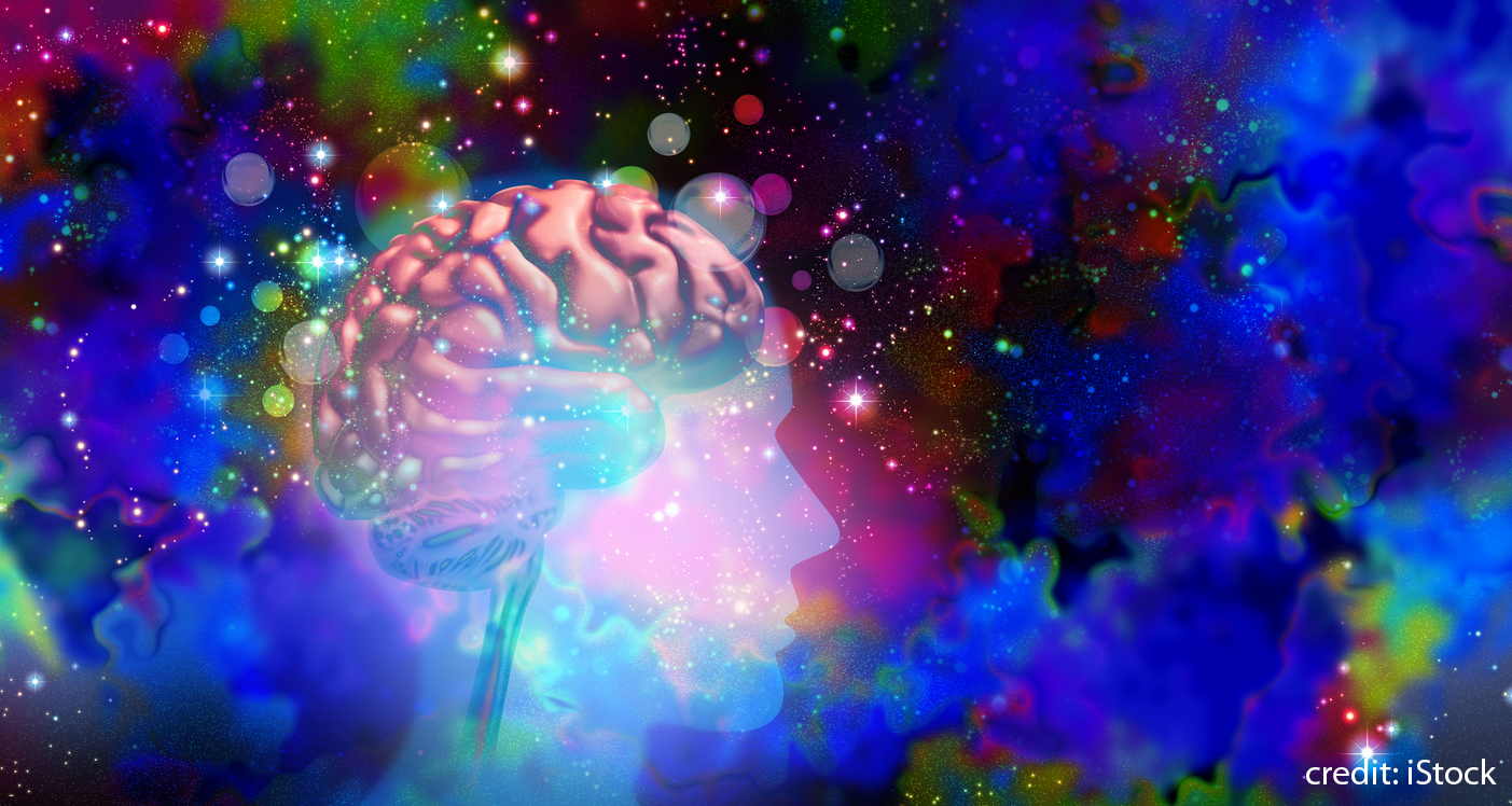 image showing a human brain surrounded by colourful elements